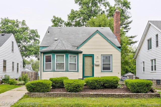 263 E Woodland St, Ferndale, MI 48220 - view of front of home featuring a chimney