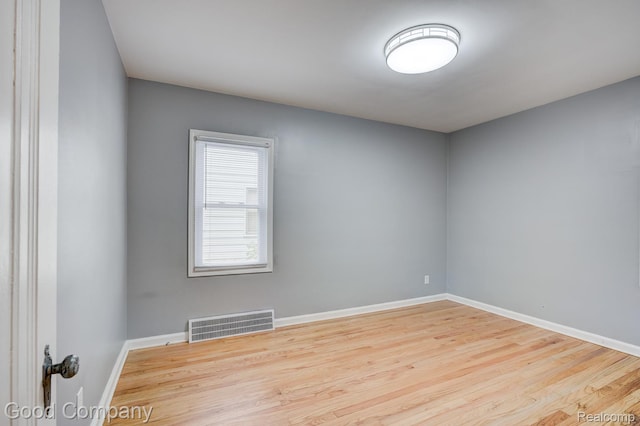 263 E Woodland St, Ferndale, MI 48220 - unfurnished room featuring wood finished floors and baseboards