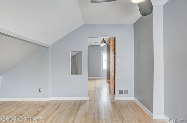263 E Woodland St, Ferndale, MI 48220 - empty room featuring a ceiling fan, wood finished floors, and vaulted ceiling