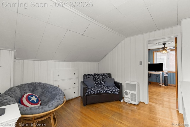 8904 Becker Ave, Allen Park, MI 48101 - living area with light wood-style flooring, lofted ceiling, a decorative wall, and a ceiling fan