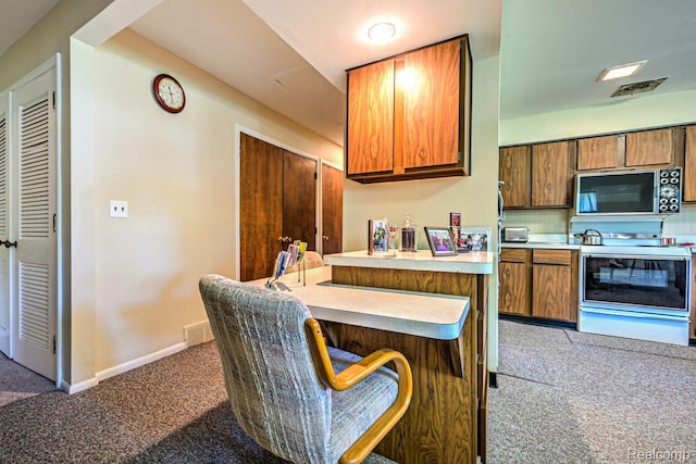 23880 Glencreek Dr, Farmington Hills, MI 48336 - kitchen featuring black microwave, electric stove, light colored carpet, and light countertops