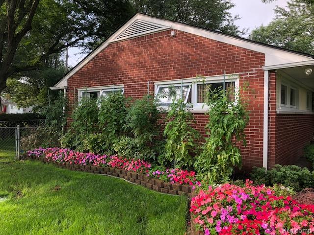 23880 Glencreek Dr, Farmington Hills, MI 48336 - view of side of home featuring brick siding