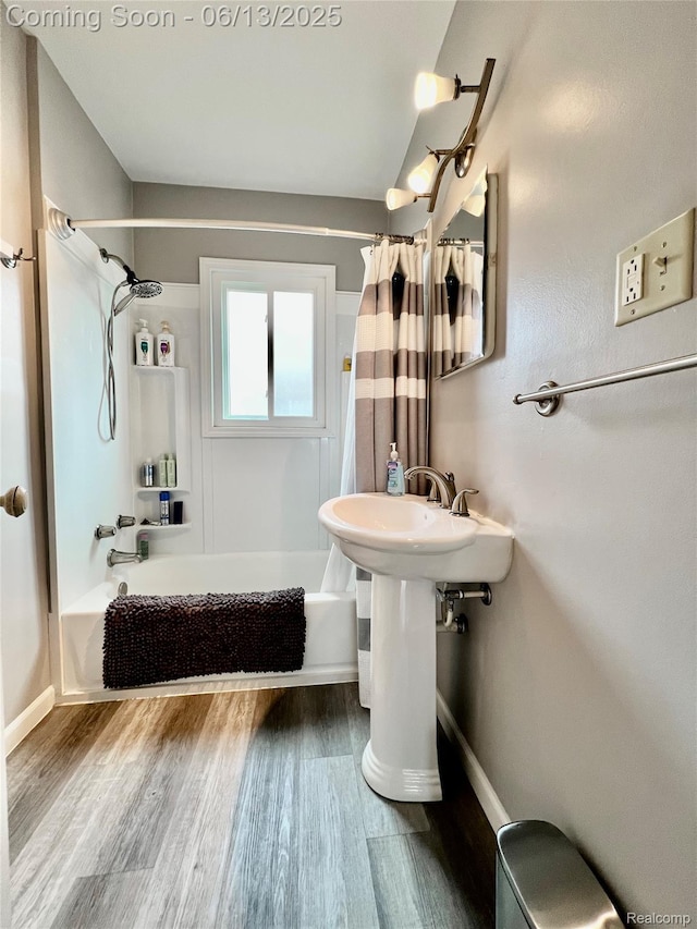 1323 16th St, Port Huron, MI 48060 - bathroom with shower / bath combo, baseboards, and wood finished floors
