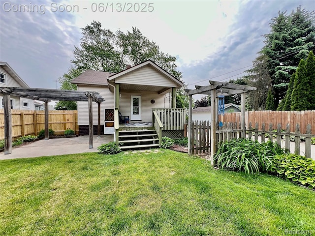 1323 16th St, Port Huron, MI 48060 - back of property featuring a pergola, a wooden deck, and a patio area