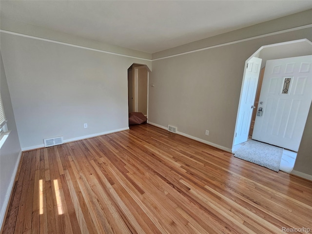 9311 Dixie, Redford, MI 48239 - unfurnished room featuring arched walkways and light wood-type flooring
