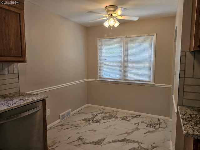 9311 Dixie, Redford, MI 48239 - unfurnished dining area featuring light marble finish flooring and ceiling fan