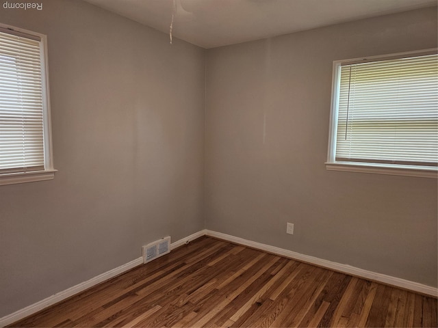 9311 Dixie, Redford, MI 48239 - unfurnished room featuring baseboards and dark wood-style floors