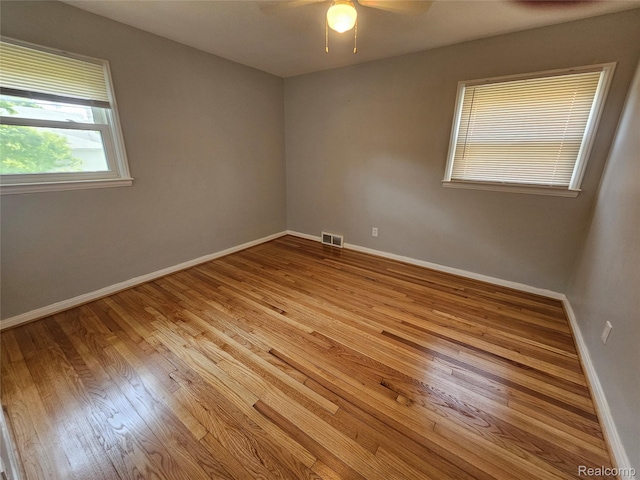 9311 Dixie, Redford, MI 48239 - spare room with a ceiling fan and wood finished floors