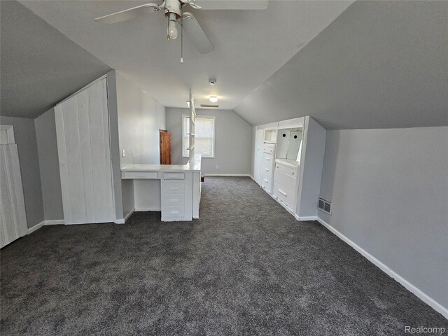 9311 Dixie, Redford, MI 48239 - bonus room featuring dark colored carpet, lofted ceiling, and a ceiling fan