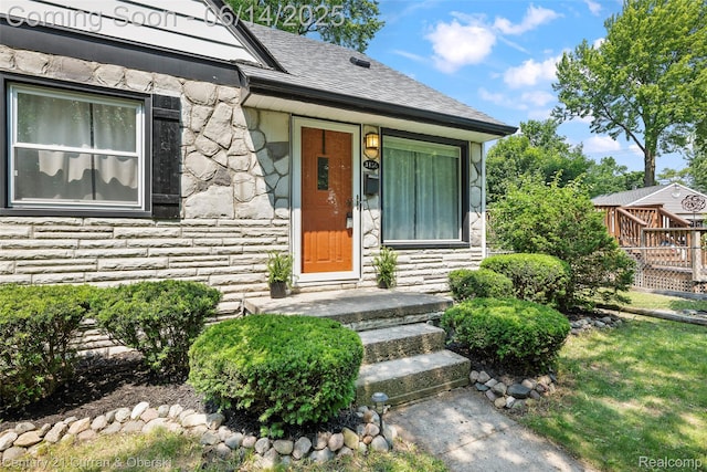 3156 Edgewood St, Dearborn, MI 48124 - entrance to property featuring stone siding and roof with shingles