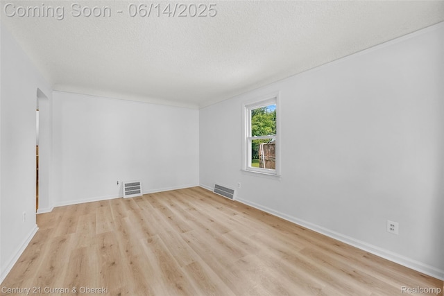 3156 Edgewood St, Dearborn, MI 48124 - unfurnished room with wood finished floors and a textured ceiling