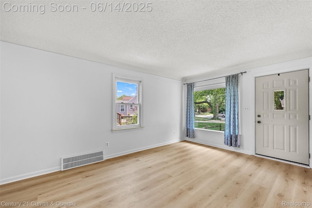 3156 Edgewood St, Dearborn, MI 48124 - entrance foyer featuring wood finished floors and a textured ceiling