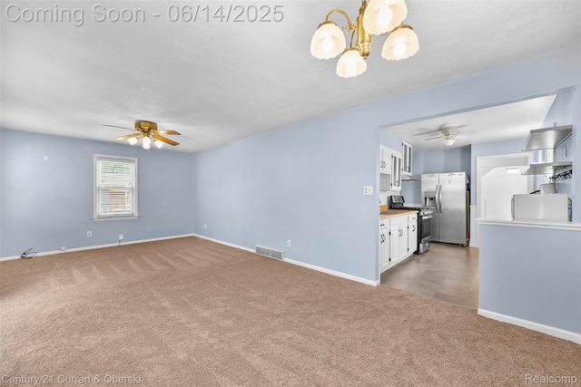 3156 Edgewood St, Dearborn, MI 48124 - unfurnished living room featuring a ceiling fan, light carpet, a chandelier, and a textured ceiling