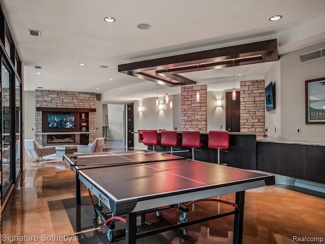 6956 Cooley Lake Rd, White Lake, MI 48383 - game room featuring recessed lighting and concrete flooring
