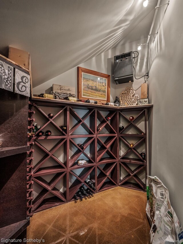 6956 Cooley Lake Rd, White Lake, MI 48383 - wine room featuring vaulted ceiling and carpet flooring