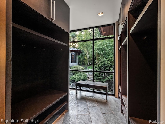 6956 Cooley Lake Rd, White Lake, MI 48383 - mudroom featuring stone tile flooring, recessed lighting, and baseboards