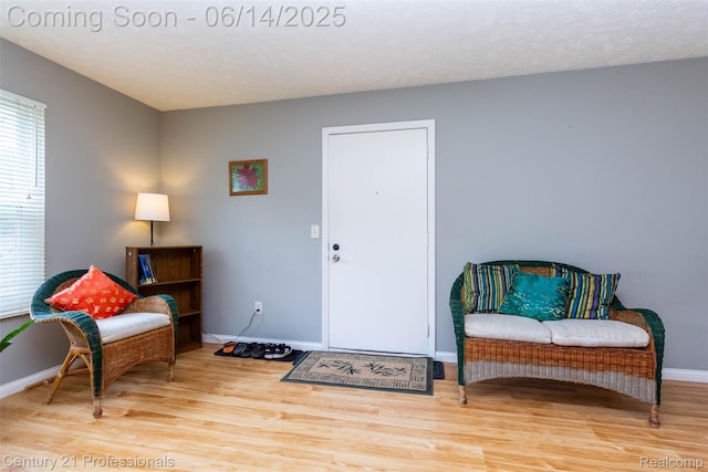 2024 Hamilton Rd Unit 6, Okemos, MI 48864 - living area with wood finished floors and baseboards