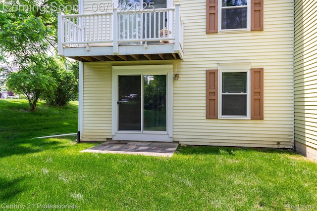 2024 Hamilton Rd Unit 6, Okemos, MI 48864 - back of property featuring a balcony and a yard