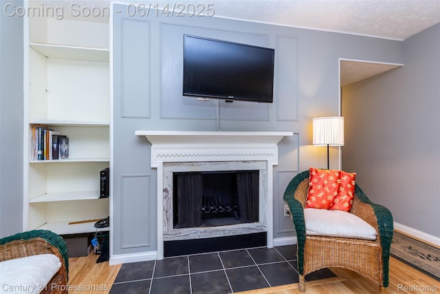 2024 Hamilton Rd Unit 6, Okemos, MI 48864 - living area with a fireplace