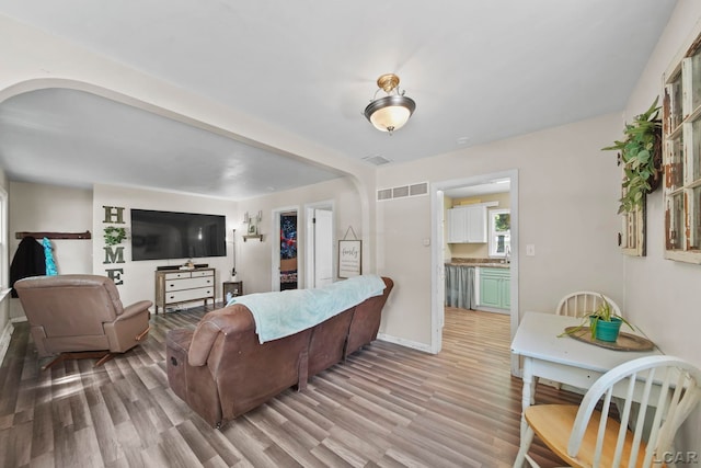 1028 Loren Rd, Adrian, MI 49221 - living area with light wood finished floors and baseboards