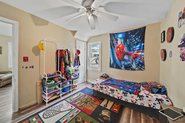 1028 Loren Rd, Adrian, MI 49221 - bedroom with wood finished floors, a ceiling fan, and baseboards