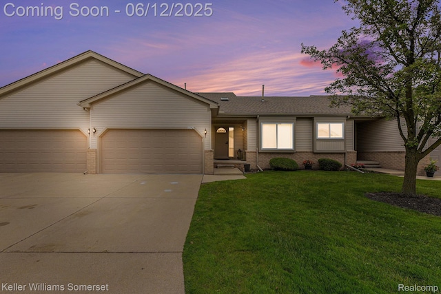 53242 Butternut St, Chesterfield, MI 48051 - view of front of house featuring brick siding, concrete driveway, an attached garage, a lawn, and a shingled roof