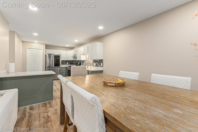 53242 Butternut St, Chesterfield, MI 48051 - dining area featuring light wood-style floors and recessed lighting
