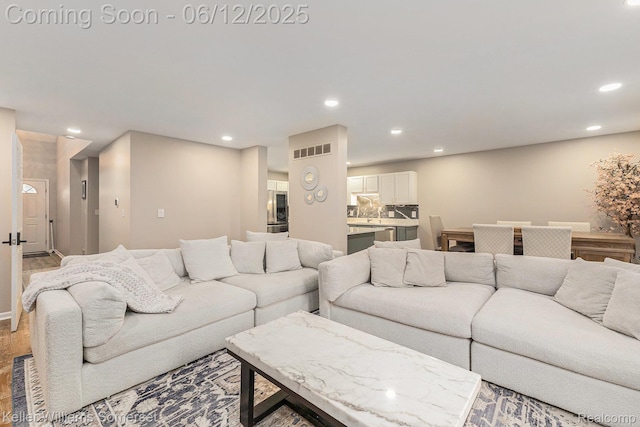 53242 Butternut St, Chesterfield, MI 48051 - living room featuring recessed lighting and light wood-type flooring