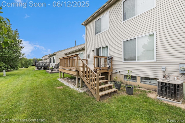 53242 Butternut St, Chesterfield, MI 48051 - rear view of property with central air condition unit, a wooden deck, a yard, and stairway
