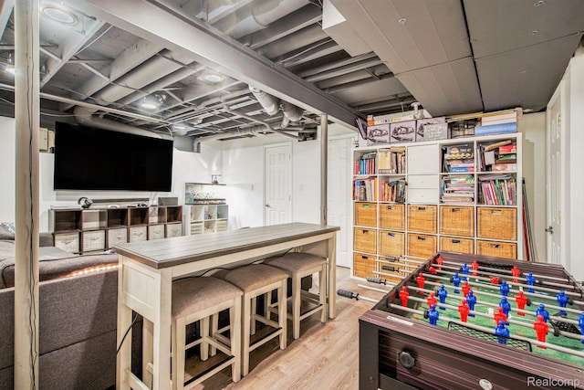18704 Gary Ln, Livonia, MI 48152 - playroom with light wood-style flooring
