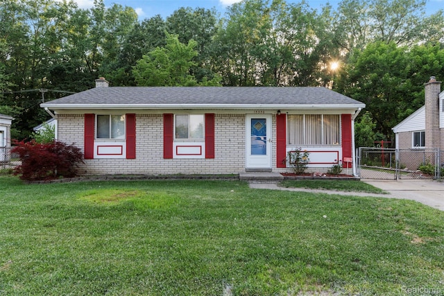 15356 Hampden St, Taylor, MI 48180 - view of front facade with brick siding, a gate, and a chimney