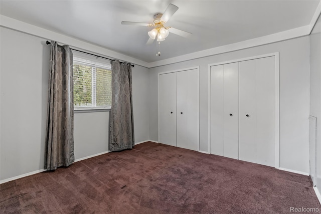 15356 Hampden St, Taylor, MI 48180 - unfurnished bedroom with carpet, two closets, and ceiling fan