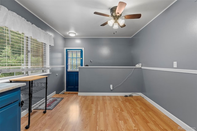15356 Hampden St, Taylor, MI 48180 - entryway featuring ornamental molding, light wood finished floors, and ceiling fan