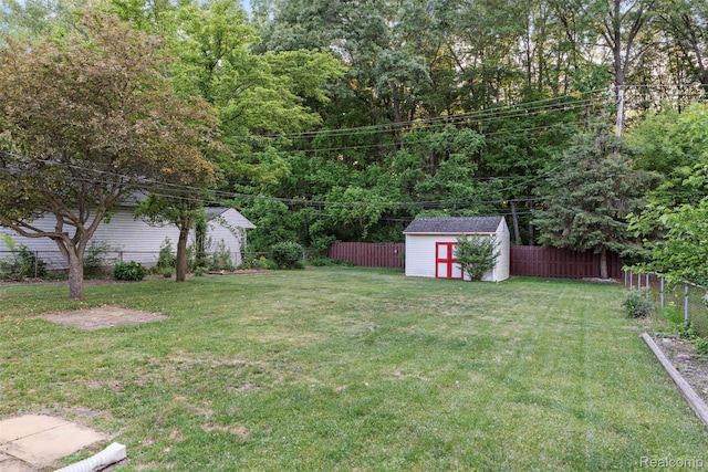 15356 Hampden St, Taylor, MI 48180 - fenced backyard featuring a storage shed