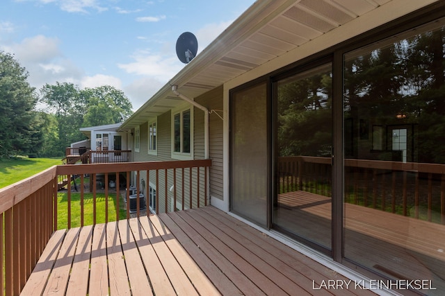 569 Appletree Dr, Holland, MI 49423 - wooden deck featuring a yard