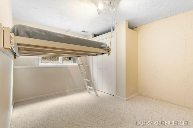 569 Appletree Dr, Holland, MI 49423 - unfurnished bedroom featuring carpet floors