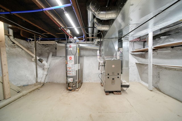 911 E Ganson St, Jackson, MI 49201 - unfinished basement with gas water heater and heating unit