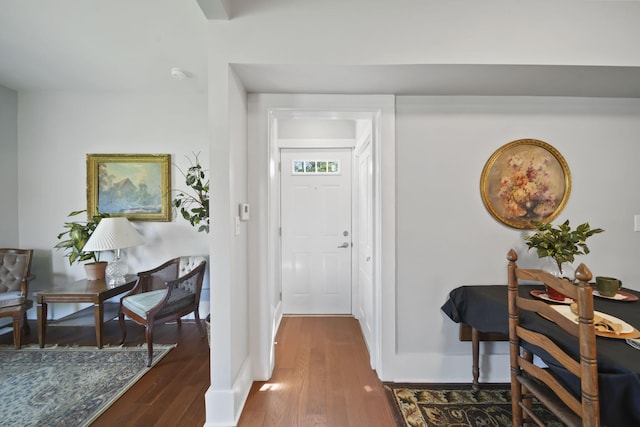 911 E Ganson St, Jackson, MI 49201 - entryway with wood-type flooring and baseboards
