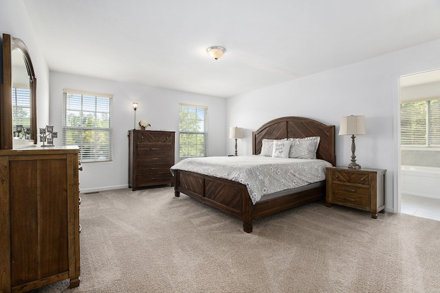 9403 Nature View Ln, Ypsilanti, MI 48197 - bedroom with multiple windows and light carpet