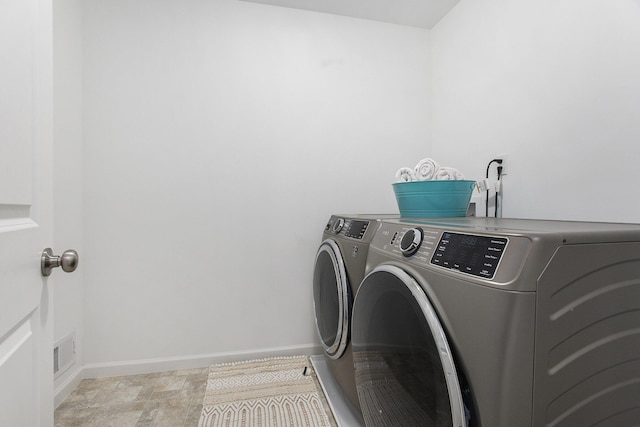 9403 Nature View Ln, Ypsilanti, MI 48197 - washroom with independent washer and dryer and baseboards