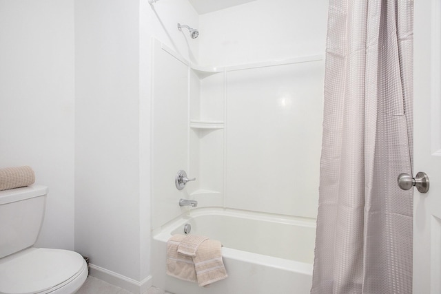 9403 Nature View Ln, Ypsilanti, MI 48197 - bathroom featuring shower / tub combo with curtain, toilet, and baseboards