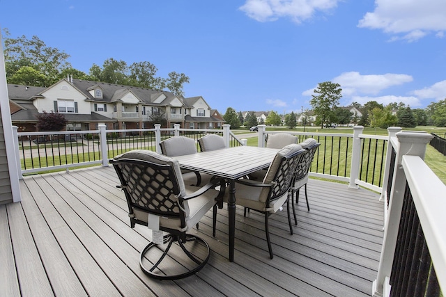 9403 Nature View Ln, Ypsilanti, MI 48197 - wooden deck featuring a residential view, outdoor dining area, and a lawn