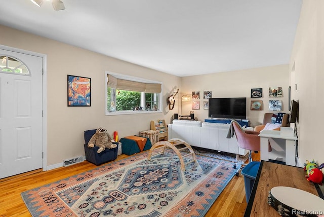 5445 Frankwill Ave, Clarkston, MI 48346 - living area featuring wood finished floors and baseboards