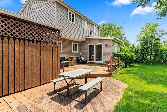 5445 Frankwill Ave, Clarkston, MI 48346 - wooden deck with a lawn and outdoor dining space