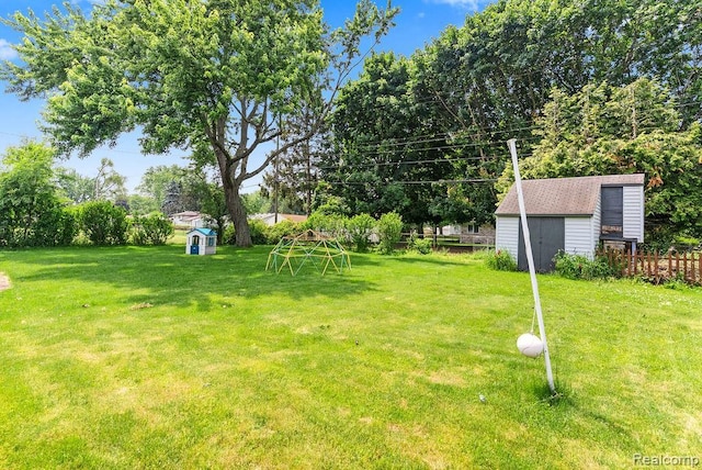 5445 Frankwill Ave, Clarkston, MI 48346 - view of yard featuring a storage unit