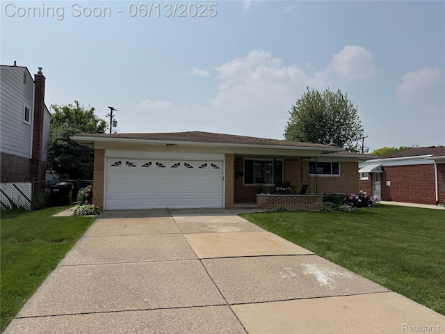 33119 Shelley Lynne Dr, Sterling Heights, MI 48312 - ranch-style home featuring an attached garage, driveway, and brick siding