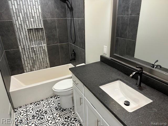 33315 Vista Way, Fraser, MI 48026 - bathroom featuring vanity, toilet, shower / bath combination, and tile patterned floors