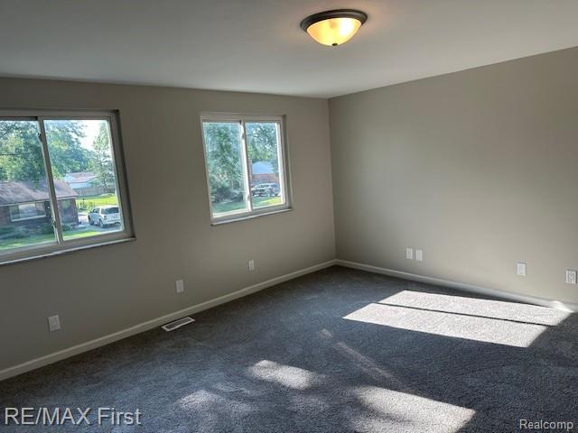 33315 Vista Way, Fraser, MI 48026 - spare room with carpet and baseboards