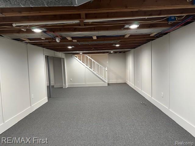 33315 Vista Way, Fraser, MI 48026 - finished below grade area with stairway, carpet floors, and baseboards