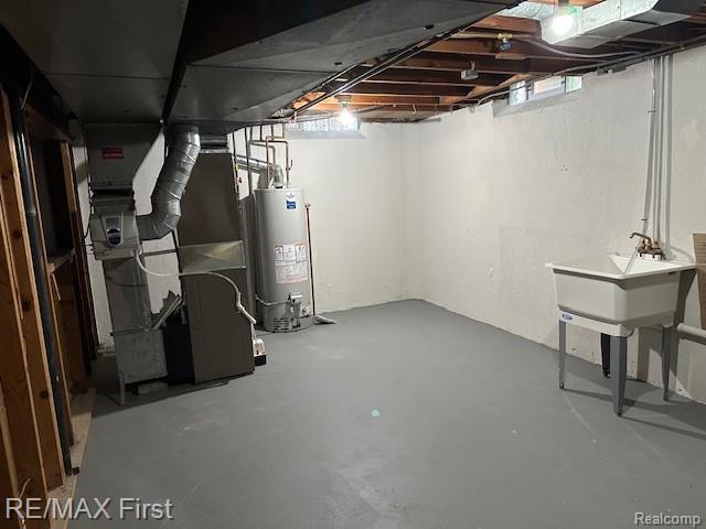33315 Vista Way, Fraser, MI 48026 - below grade area featuring gas water heater and heating unit
